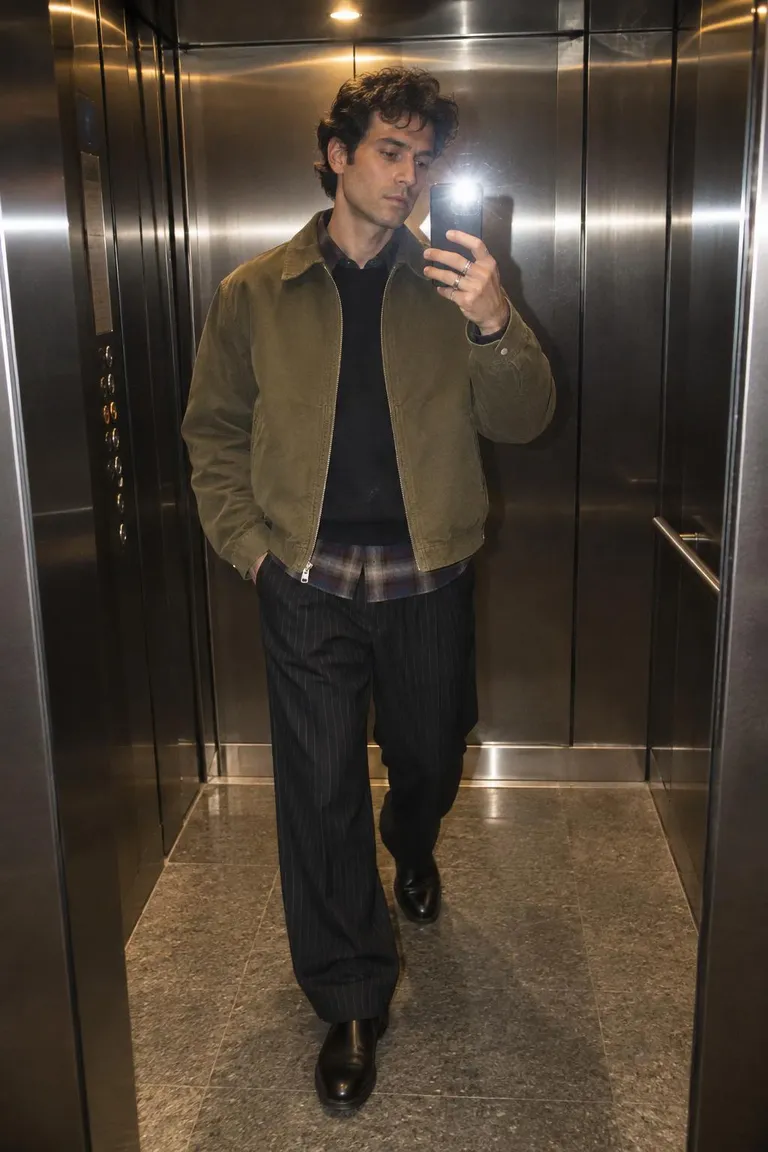 mirror selfie of Olive Canvas Utility worn by a man in his thirties — elevator mirror